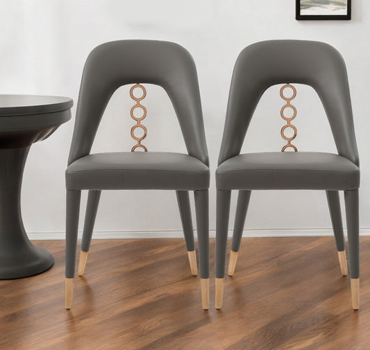 Set of Two Gray Faux Leather Dining Side Chairs With Rose Gold Accents-0